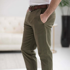 Flat front adaptive chino twill pants in olive color, showcasing pockets and a comfortable fit for mobility-limiting conditions.