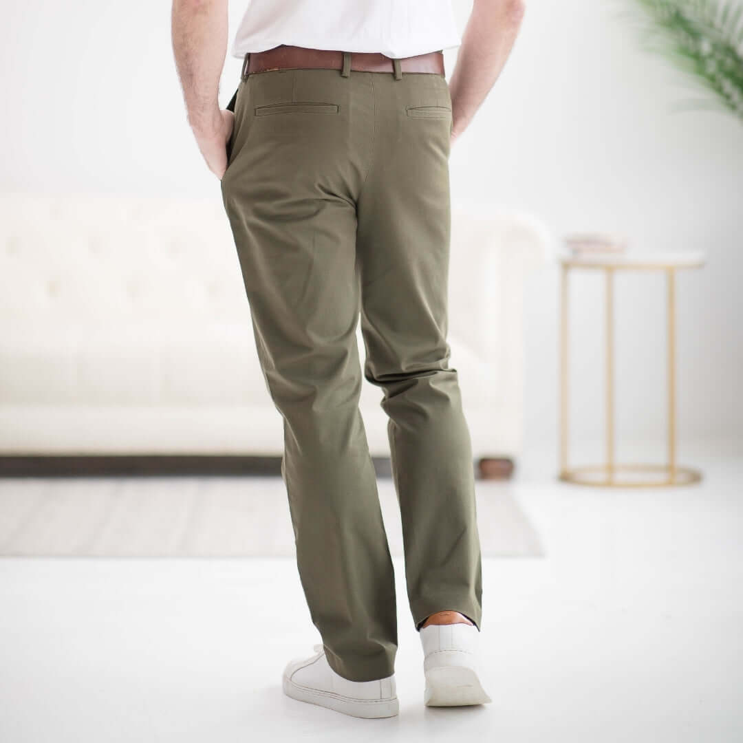 Rear view of olive chinos with magnetic closures, designed for comfort and ease for individuals with mobility limitations.